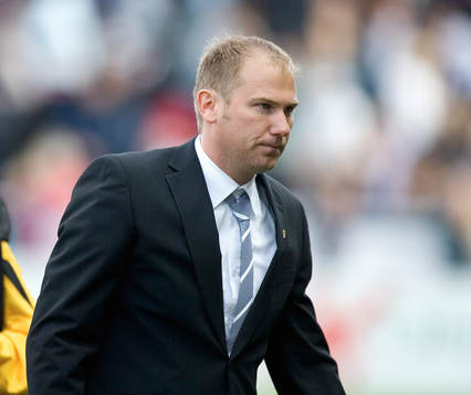 Magnus Haglund, tränare, glad och samlad när slutsignalen