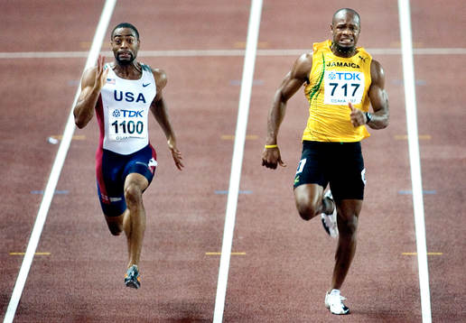 Tyson Gay, USA vinner 100 meter. Asafa Powell, Jamaica bara