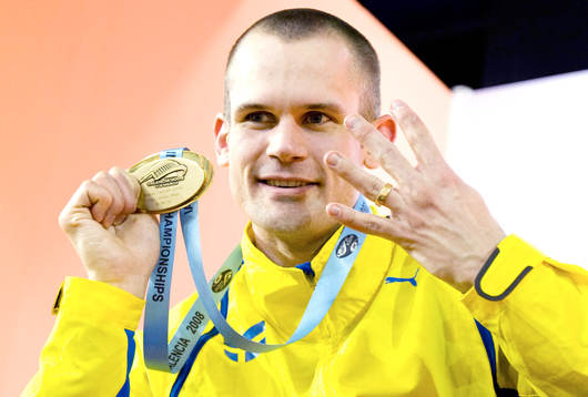 Stefan Holm på prispallen med sitt 4:e inne-VM guld. Medalj