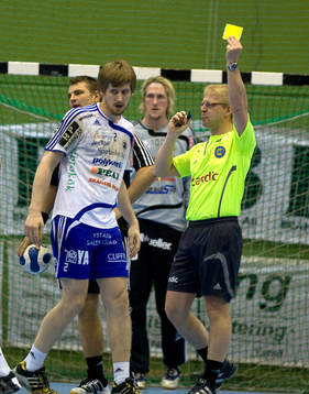 Domare, gult kort, varning