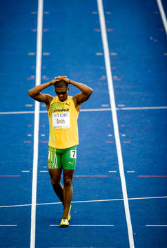 Maurice Smith, Jamaica, sträckte sig i låret redan på