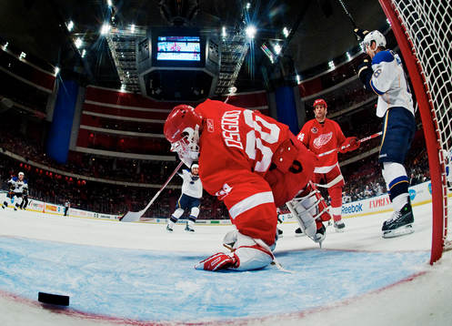 Chris Osgood, målvakt, Detroit, depp och Jay McClement, St
