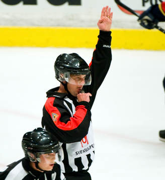 Markus Winnerborg, domare. Tecken