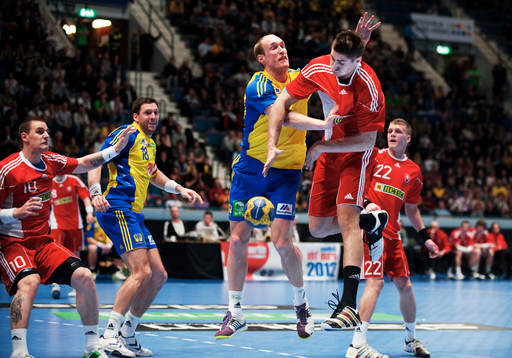 Johan Jakobsson, Sverige, stoppar Oliver Rabek, Slovakien