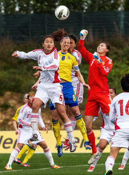Lotta Schelin, Sverige, i nickduell med WU HAIYAN, och