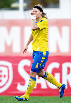 Sara Thunebro, Sverige, kysser sitt svettband