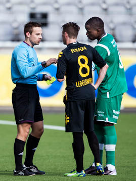 Domare Kristoffer Karlsson i samtal med Nikolas Ledgerwood,