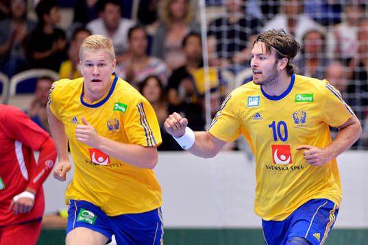 Sveriges Helge Freiman (th) jublar