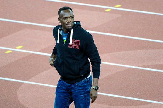 Usain Bolt går över löparbanan
