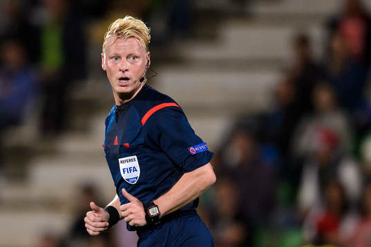 Domare Kevin Blom