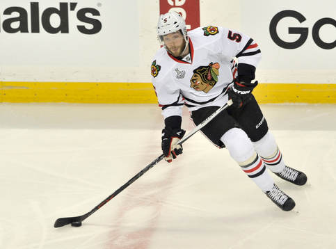 The Blackhawks' David Runblad skates through the neutral