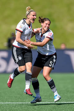 Tysklands Anja Mittag och Annike Krahn jublar