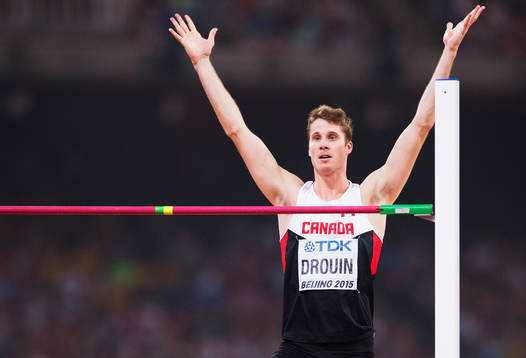 Kanadas Derek Drouin jublar i finalen på höjdhopp