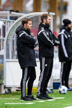 s tränare Johan Norberg (v) och Jens Hedström (h)