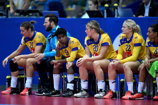 Sveriges Sabina Jacobsen, förbundskapten Henrik Signell,