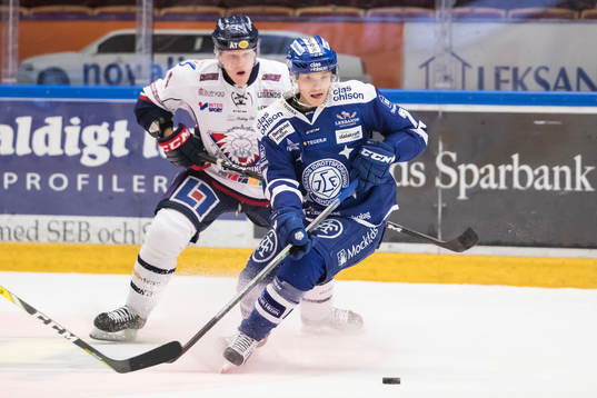 Leksands Johan Olofsson  i ishockeymatchen i SHL mellan