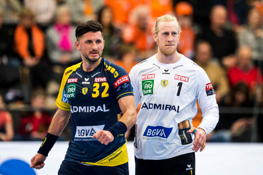 Rhein Neckar Löwen Alexander Petersson och målvakt Mikael