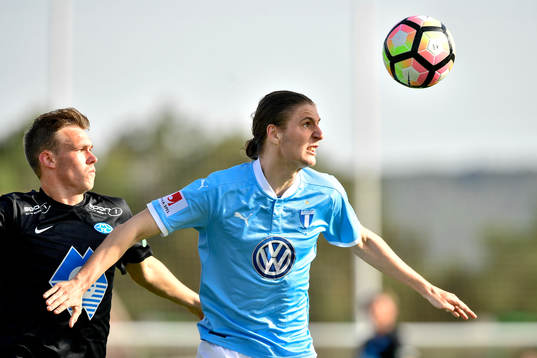 Moldes Kristian Strande och Malmö FFs Pawel Cibicki