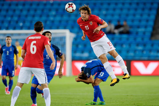 Sander Berge of Norway with a header