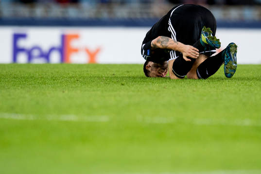 Nicklas Bendtner of Rosenborg lies down
