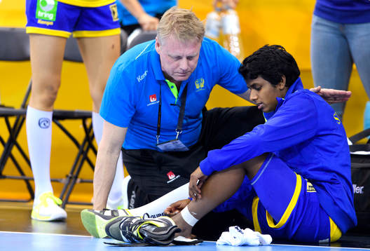 Sveriges sjukgymnast Anders Broström och Loui Sand i