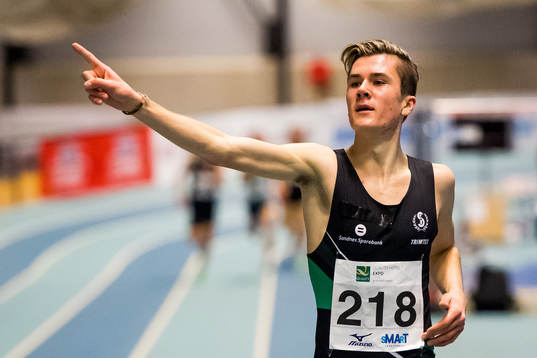 Jakob Ingebrigtsen competes to win the men's 1500 m