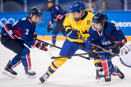 Sara Hjalmarsson of Sweden in action with Eom Suyeon of
