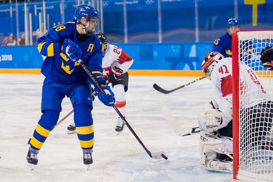 Anna Borgqvist of Sweden and goaltender Florence Schelling