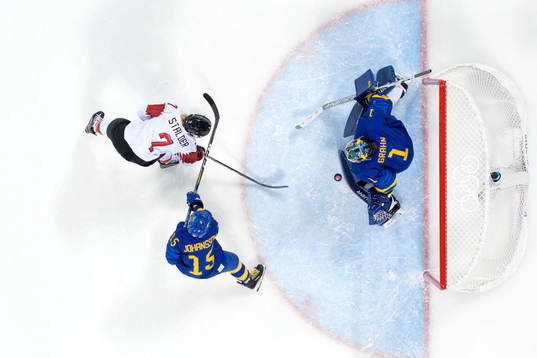 Lara Stalder of Switzerland with the puck in front of