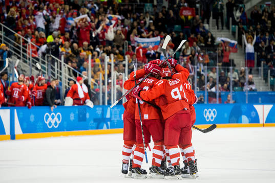 Vyacheslav Voinov of Russia (OAR) celebrates with teammates