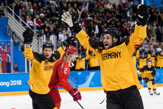 Patrick Hager and Brooks Macek of Germany celebrates the