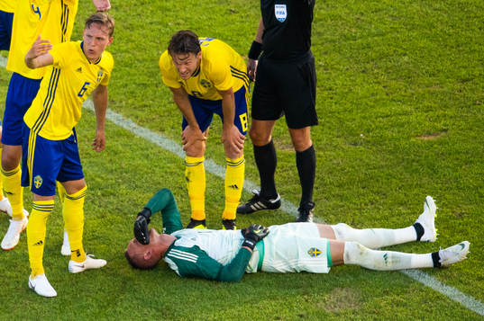 goalkeeper Robin Olsen of Sweden lies down