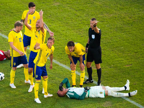 goalkeeper Robin Olsen of Sweden lies down
