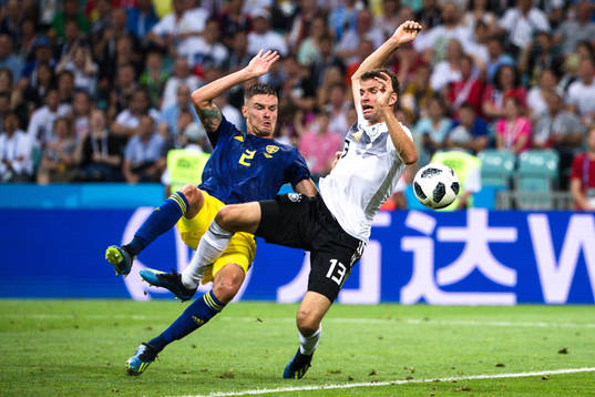 Mikael Lustig of Sweden and Thomas Müller of Germany