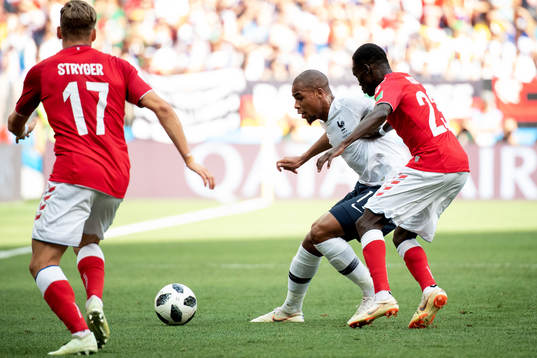Djibril Sidibe of France and Pione Sisto of Denmark