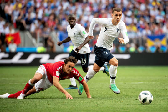 Thomas Delaney of Denmark and Antoine Griezmann of France