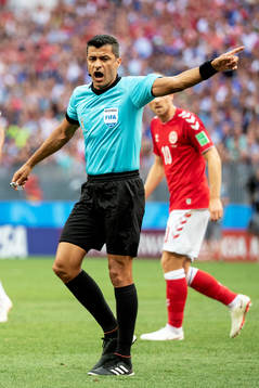referee Sandro Ricci