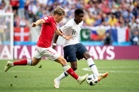 Jens Stryger Larsen of Denmark and Ousmane Dembele of France