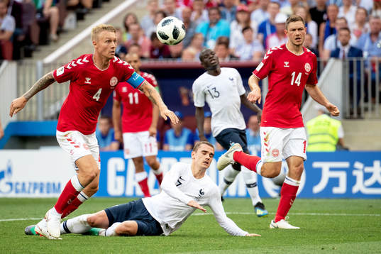 Simon Kjaer and Henrik Dalsgaard of Denmark and Antoine