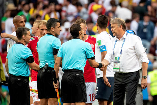 head coach Åge Hareide of Denmark and referee Sandro Ricci
