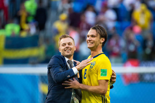 Sebastian Larsson and Albin Ekdal of Sweden celebrate