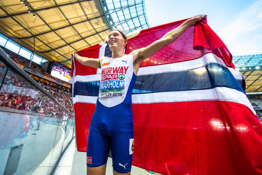 Karsten Warholm celebrates