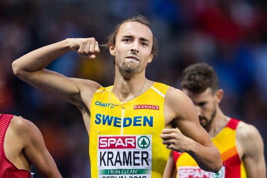 Andreas Kramer of Sweden celebrates as he finishes in