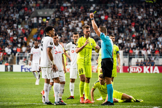 Pepe of Besiktas is shown a yellow card by the referee