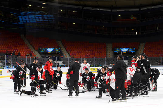The team gathers