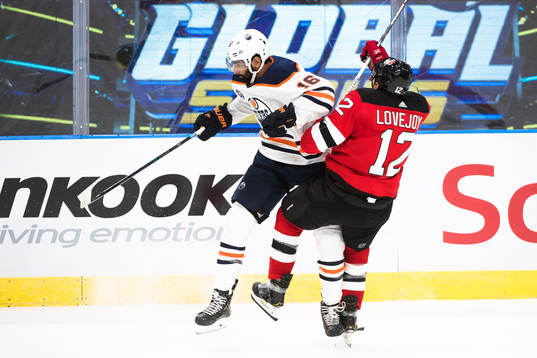 Jujhar Khaira of the Edmonton Oilers and Ben Lovejoy of the