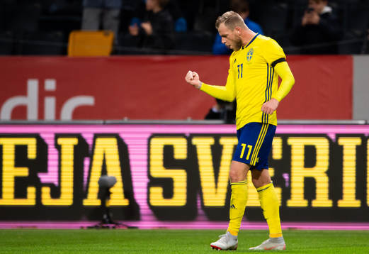 John Guidetti of Sweden celebrates