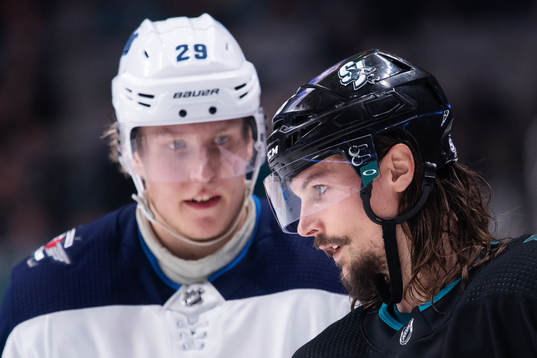 Patrik Laine of Winnipeg Jets and Erik Karlsson of San Jose