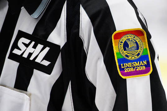 Ett emblem för linjedomare