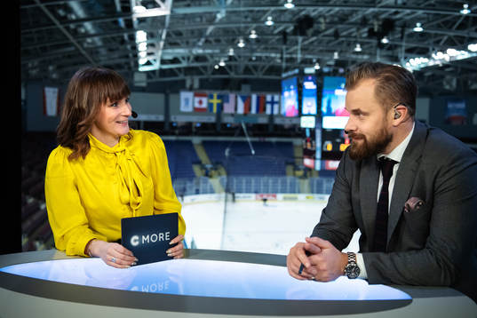 TV commentators Lena Sundqvist and Sanny Lindström in the